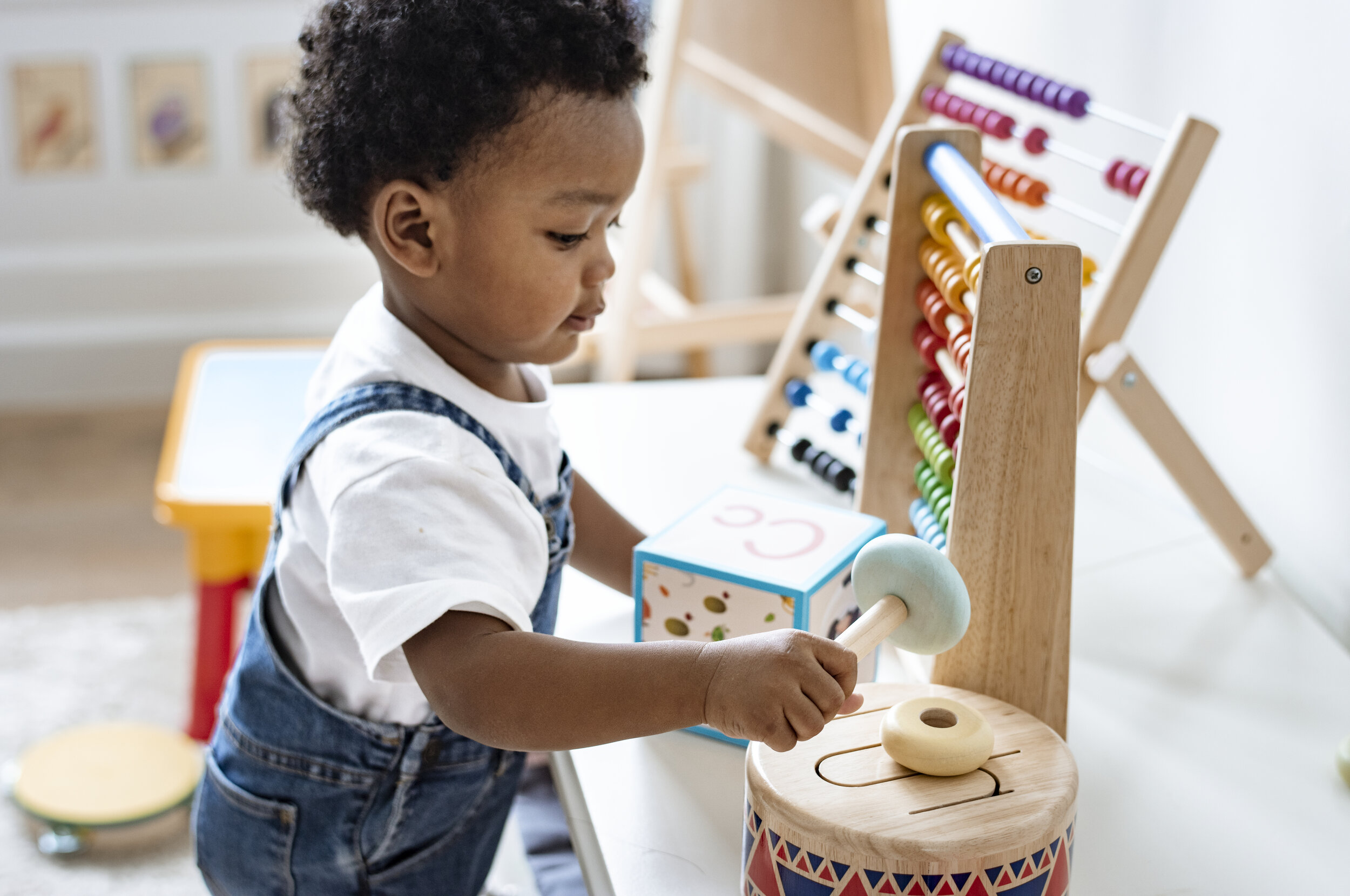 Preschool student in quality early childhood program recommended by educational consultant